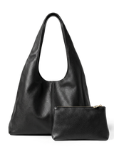 The Anse in Noir with its matching leather pouch on a black background
