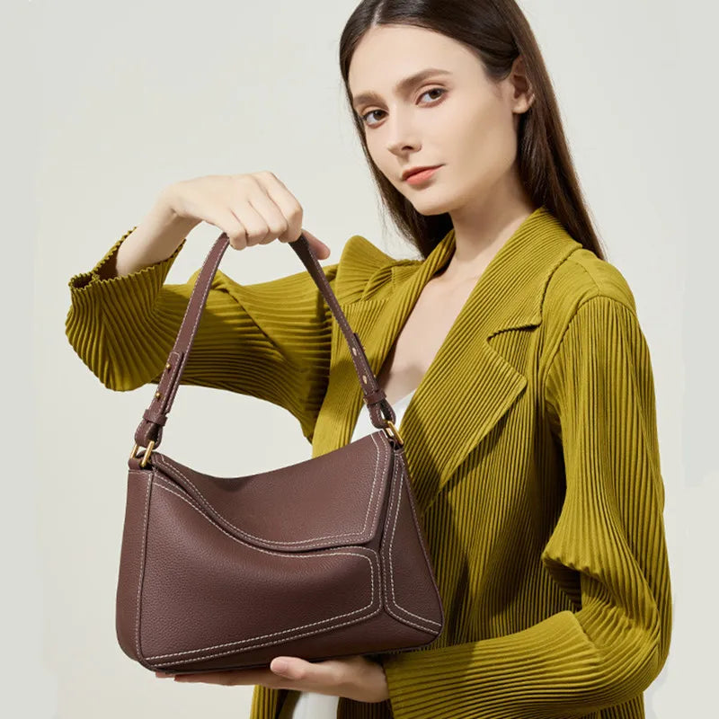 Luxe nieuwe design handtassen vrouwelijke crossbody tas vintage high-end geometrie echte koeienhuid lederen tas damesmode onderarmtas