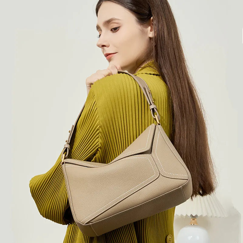 Luxe nieuwe design handtassen vrouwelijke crossbody tas vintage high-end geometrie echte koeienhuid lederen tas damesmode onderarmtas