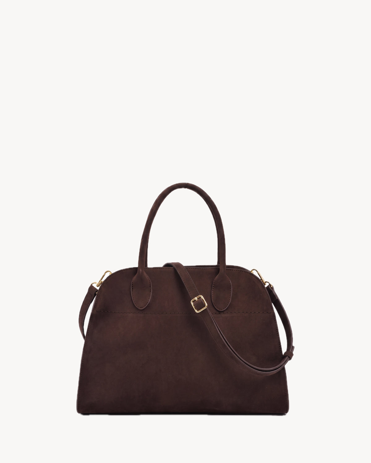 The Aurore Suede Satchel in Espresso with detachable shoulder strap clipped to the side rings