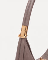 The Nacre in Galet, rounded handle with gold cuff