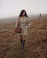 The Aurore Suede Satchel in Chocolate, by the stream