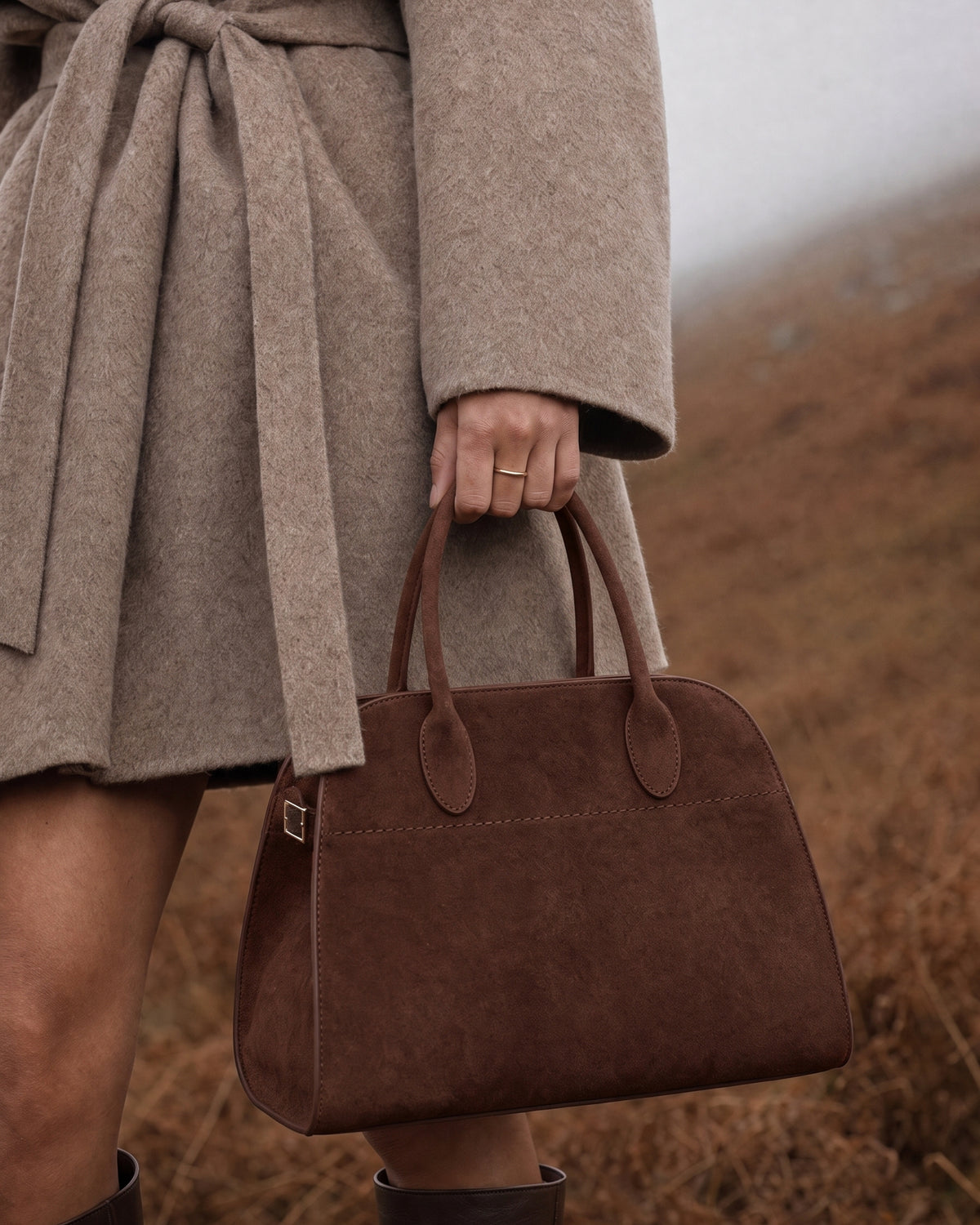 The Aurore Suede Satchel in Chocolate, detail on the body