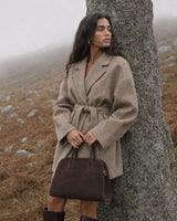 The Aurore Suede Satchel in Espresso, detail on the body
