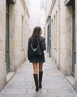 The Jusant Carryall in Noir worn as a backpack